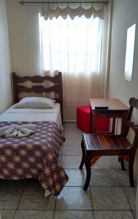 Quarto Individual com Banheiro Compartilhado